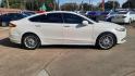 2016 Ford Fusion (3FA6P0HDXGR) , located at 16710 Clay Rd., Houston, TX, 77084, (281) 859-7900, 29.834864, -95.656166 - Photo#2